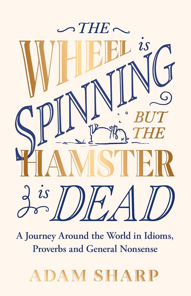 The Wheel is Spinning but the Hamster is Dead: The perfect gift for language lovers & book obsessives this Christmas! cover image